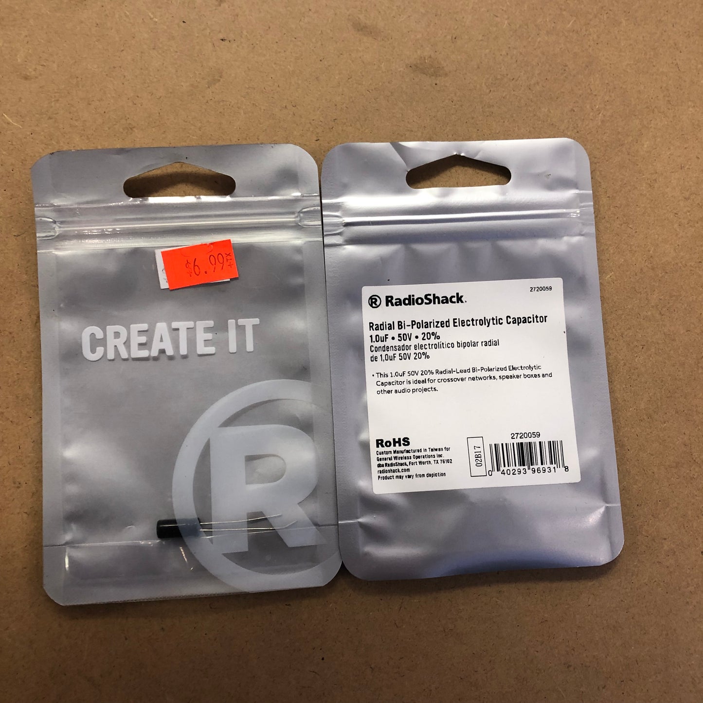 RADIOSHACK RADIAL BI-POLARIZED ELEVTROLYTIC CAPACITOR 1.0uF - 50V - 20%